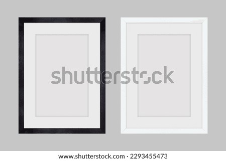 Black wood frame and white picture frame isolated on gray background. Object with clipping path Royalty-Free Stock Photo #2293455473