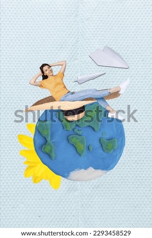 Photo of lying comfortable chilling girl hands head dreaming flying paper airplanes plasticine planet sunhat isolated on blue background