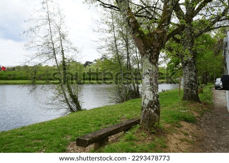 bench next to a pond