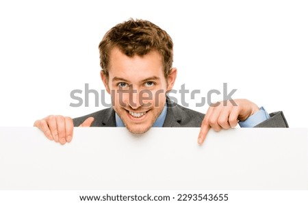 Place your design here. Shot of a businessman holding a blank placard against a studio background. Royalty-Free Stock Photo #2293543655