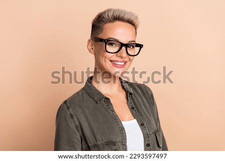 Portrait of young blonde short hairdo lady eyeglasses wear khaki shirt new profile linkedin picture isolated on beige color background