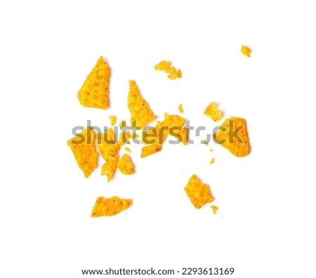 Nachos Chips Pieces Isolated, Nacho Snack Crumbs, Broken Mexican Triangle Corn Chips, Crumbled Maize Snack, Corn Crisps or Totopos, Nachos on White Background Top View Royalty-Free Stock Photo #2293613169