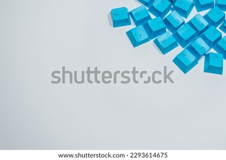 Quarter screen blue keyboard buttons isolated dynamic composition on a white background. 