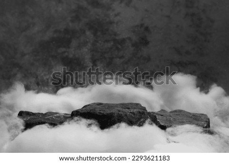 Three Rock Tops for a Product Display, Showing Middle Close Focus to the Stone Surface on an Artistic Cloudy Foreground and Background with a Bokeh Balls Sky.