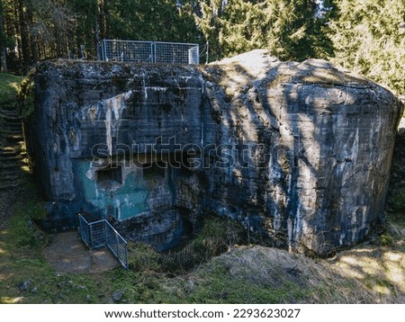 An abandoned concrete bunker in forest. Orlicke hory, Czechia