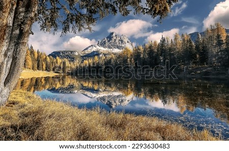 Wonderful Autumn view of Lake Antorno (Lago di Antorno) in Dolomites Alps during sunset. Italy. Colorful autumn landscape. Iconic location for landscape photographers. amazing natural background