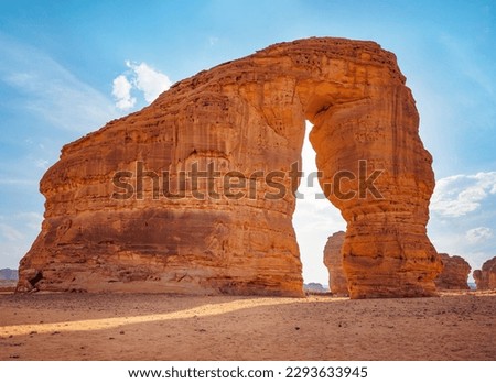 Jabal AlFil - Elephant Rock in Al Ula desert landscape, bright sun behind Royalty-Free Stock Photo #2293633945