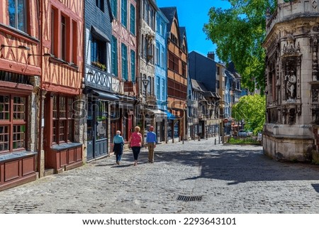 Street with timber framing houses in Rouen, Normandy, France. Architecture and landmarks of Rouen. Cozy cityscape of Rouen Royalty-Free Stock Photo #2293643101
