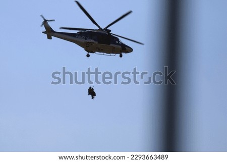 photo of police helicopter in action
 
