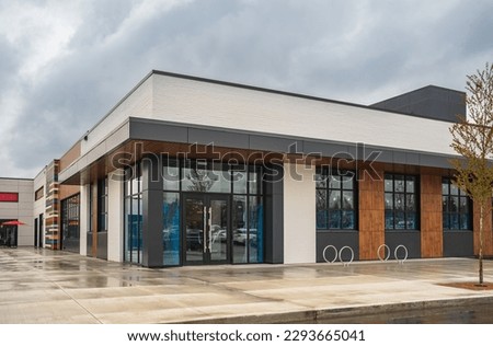 Photo of the mall shopping street in North America. Exterior of a new shopping centre building. Mall complex outdoor. Nobody, street photo Royalty-Free Stock Photo #2293665041