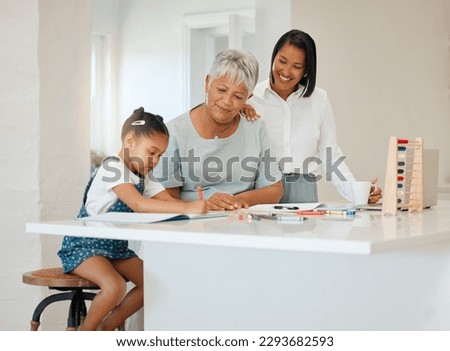 Ma, thats not a tree, its a dog. Shot of a young girl getting help from her mother and grandma while doing her homework at home.