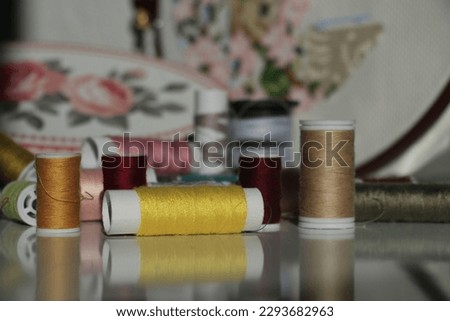 colorful threads. red green yellow blue white gray. Knitting is also used in handicraft.