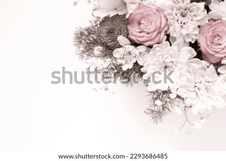 Delicate floral arrangement on white background with copy space for text. Flowers composition close up Valentines day, Mothers day. Flat lay, top view