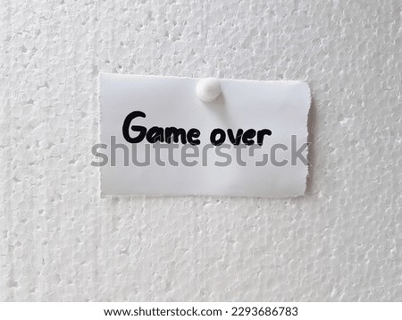 Text game over on a white background.