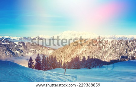 Skiing area in West Alps in the morning light. Beautiful winter landscape - nature and sport toning picture 