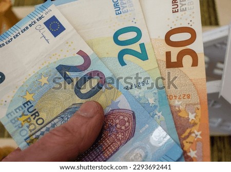 some euro notes in my left hand