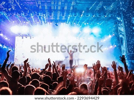 crowd partying stage lights live concert summer music festival