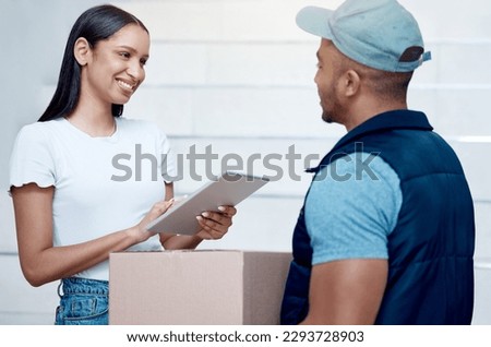 Thank you for getting this to me so quickly. Shot of a young woman using a digital tablet to sign for her delivery from the courier.