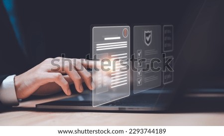 Businessman checking the steps through document with a list of checkboxes ,regulation ,Concepts of practices and policies , procedure company articles of association Terms and Conditions Royalty-Free Stock Photo #2293744189