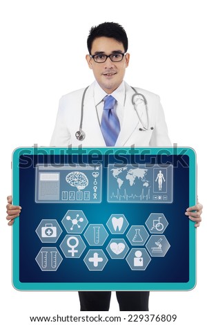 Portrait of male doctor showing medical icon on the modern medical interface