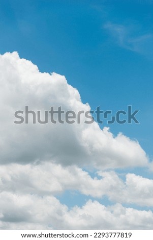 Large cloud on blue sky.