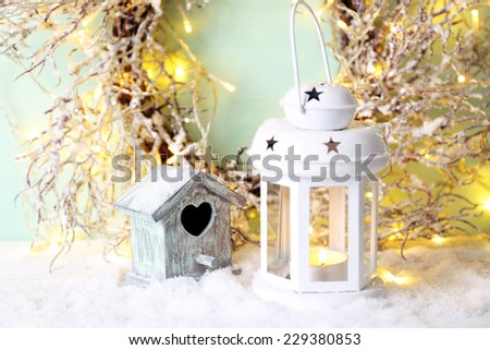 Beautiful Christmas composition with small bird house