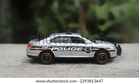 A photo of a police car replica that looks very real