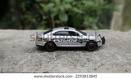 A photo of a police car replica that looks very real