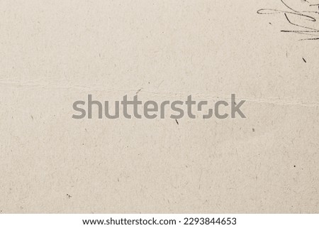 Texture of old ecological paper with doodles, recyclable material, background for design, copy space Royalty-Free Stock Photo #2293844653