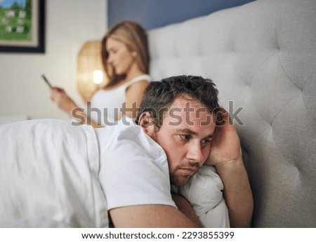 There is no such thing as privacy anymore. Shot of a young woman using a cellphone after an argument with her husband. Royalty-Free Stock Photo #2293855399