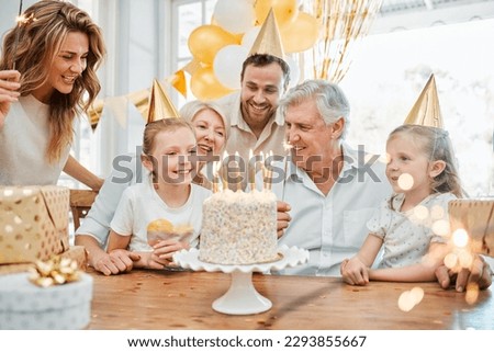 Time flies by, take every opportunity to celebrate it. Shot of a happy family celebrating a birthday at home.