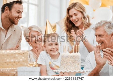 Happy birthday to our little ray of sunshine. Shot of a happy family celebrating a birthday at home.