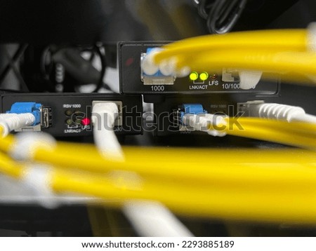 Selective focus, The Ethernet media converter Fiber optic to UTP show status error and normally. Royalty-Free Stock Photo #2293885189