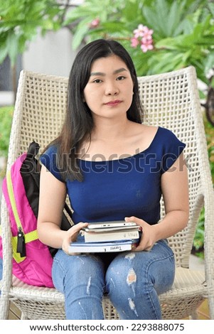 Serious Diverse Girl Student With Notebooks Royalty-Free Stock Photo #2293888075