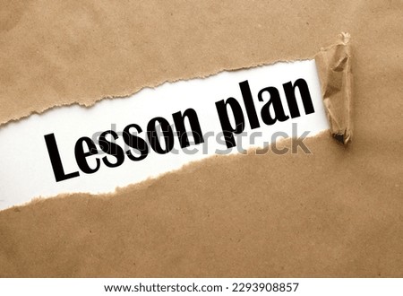 text on torn paper .text in black font on white page : Lesson Plan