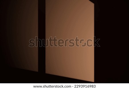 window shadow in orange wall