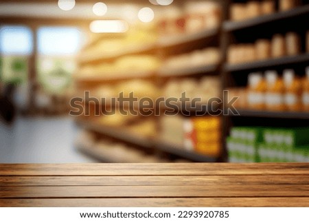 Tabletop view on modern product display in grocery or department store with wooden table and blurred backdrop for advertising and promotion on table showcase. Flawless