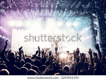 crowd partying stage lights live concert summer music festival Royalty-Free Stock Photo #2293931193