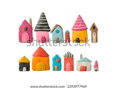 Multicolored plasticine buildings. Set of cute handmade houses. Modelling clay .