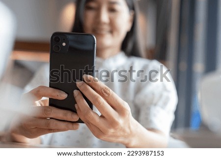 woman using cell phone hand holding mobile texting message contact us.chatting,search internet information.technology device communication connecting