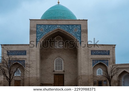 Beautiful Uzbekistan Tashkent classic mosaic photo, view of Barak Khan Madrasah Mosque with Arabic Qoran writings on the building, Hast Imam Square (Hazrati Imam) is a religious center of Tashkent.