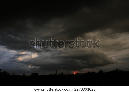 Cloudy dark sunset and scary cumulonimbus