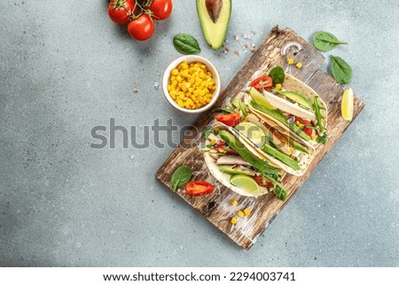 Mexican Taco, Fajita, Salsa sauce, Corn Tortillas, Nachos, Burrito on a wooden board. banner, menu, recipe place for text, top view.