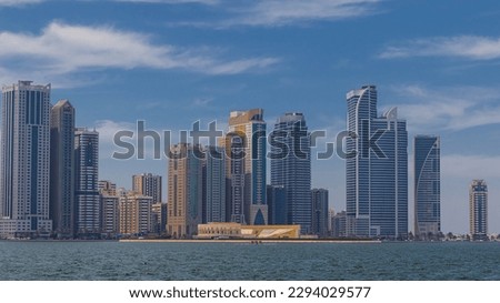 Sharjah city view, high rise buildings with lagoon. High quality photo