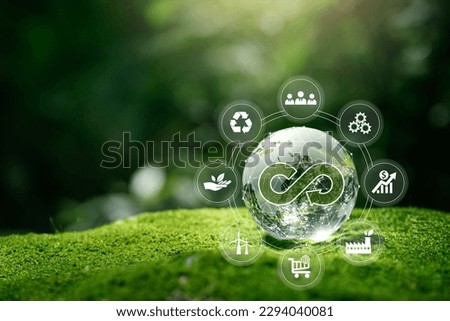 Circular economy concept.crystal globe with a circular economy icon around it.circular economy for future growth of business and design to reuse and renewable material resources.reusing, recycling. Royalty-Free Stock Photo #2294040081