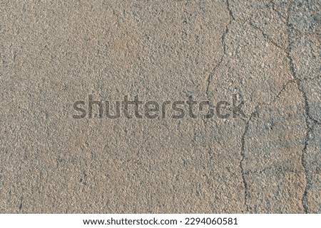 closeup of cracks on asphalt road.bad asphalt