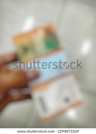 Defocused photo of Indonesian five thousand rupiah currency