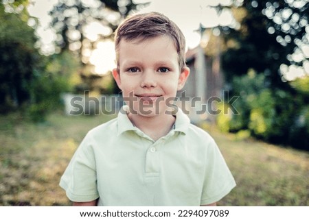 Shot of an adorable little boy standing outside. 
