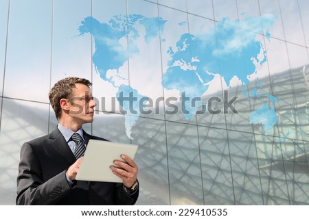 business man with tablet world map cloud computing global communication concept Royalty-Free Stock Photo #229410535