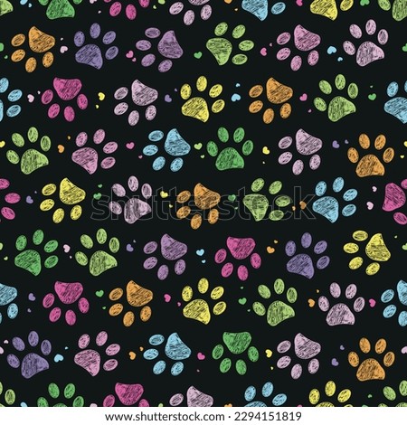 Colorful beautiful colors seamless fabric design paw prints pattern with black background